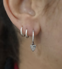 Silver hoops with crest
