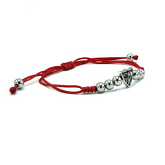 Steel bracelet with balls, shield and red macramé