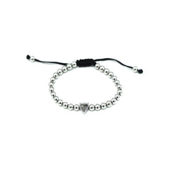 Stainlesss Steel bracelet with balls, shield and black macramé